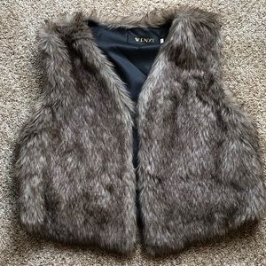 Faux Fur vest, one snap closure.